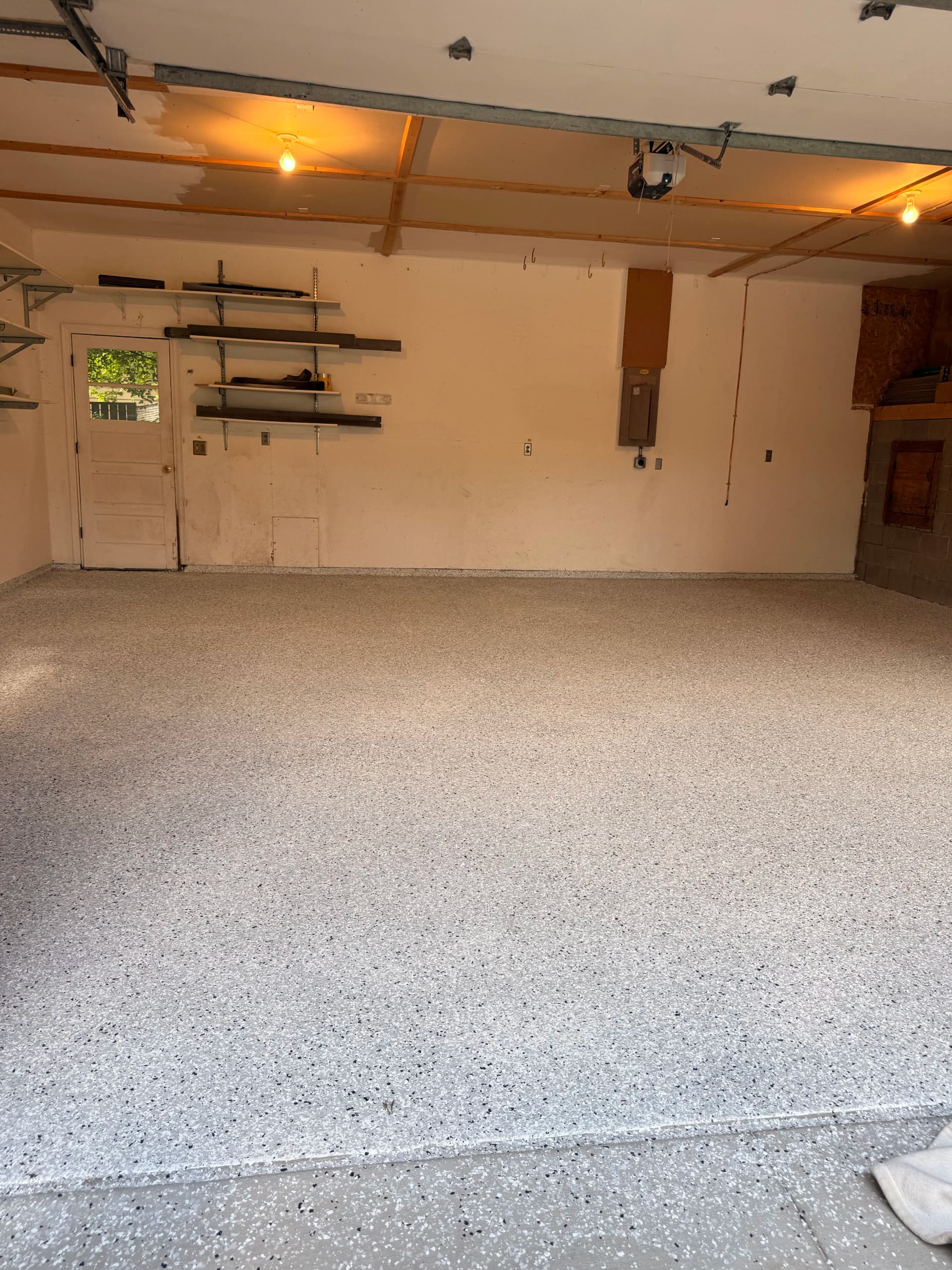 Gallery photos for New Home Garage Makeover with Epoxy Flooring and Bold Wall Paint: Image #1